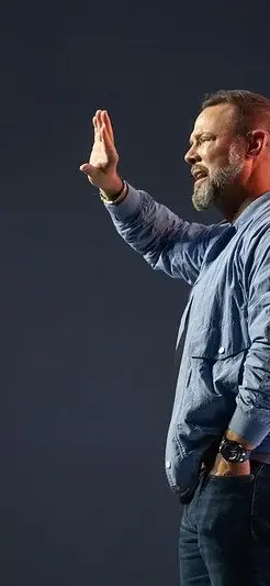 Pastor Joel preaching at Oaks Church