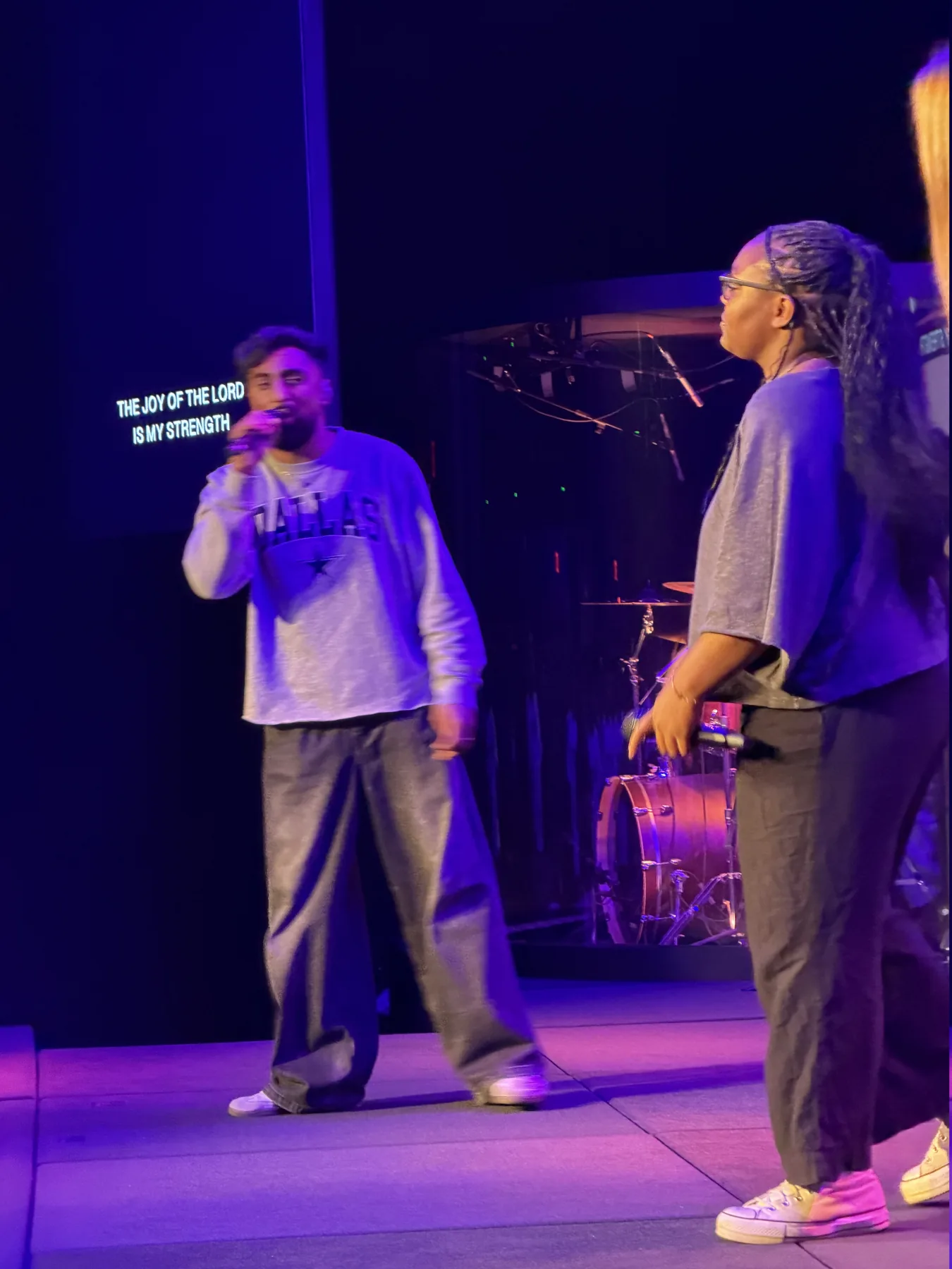 Two vocalists share a worship moment on the Forge One Day stage