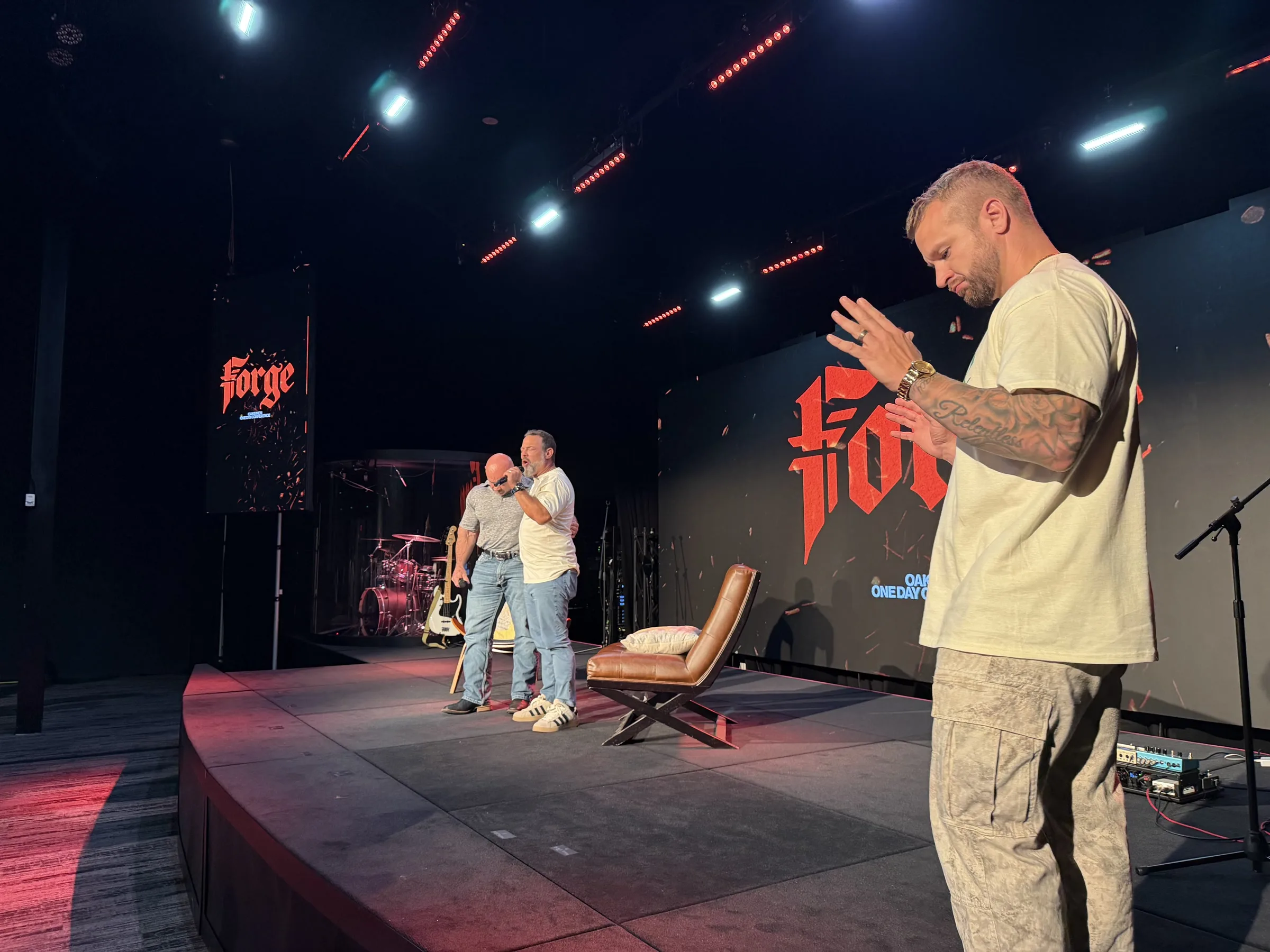 A man speaks from the floor during a Forge One Day session